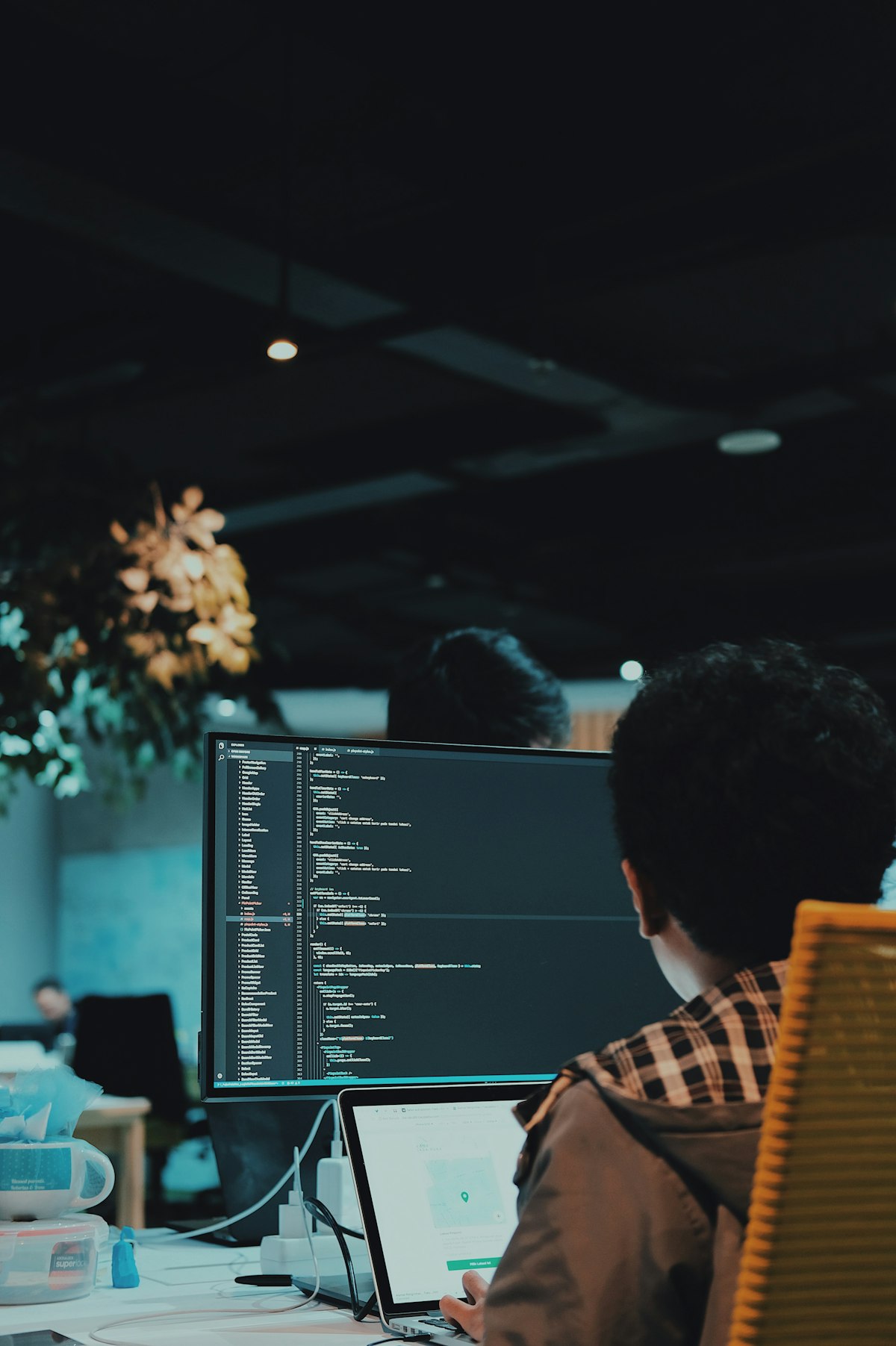 A young developer at a computer